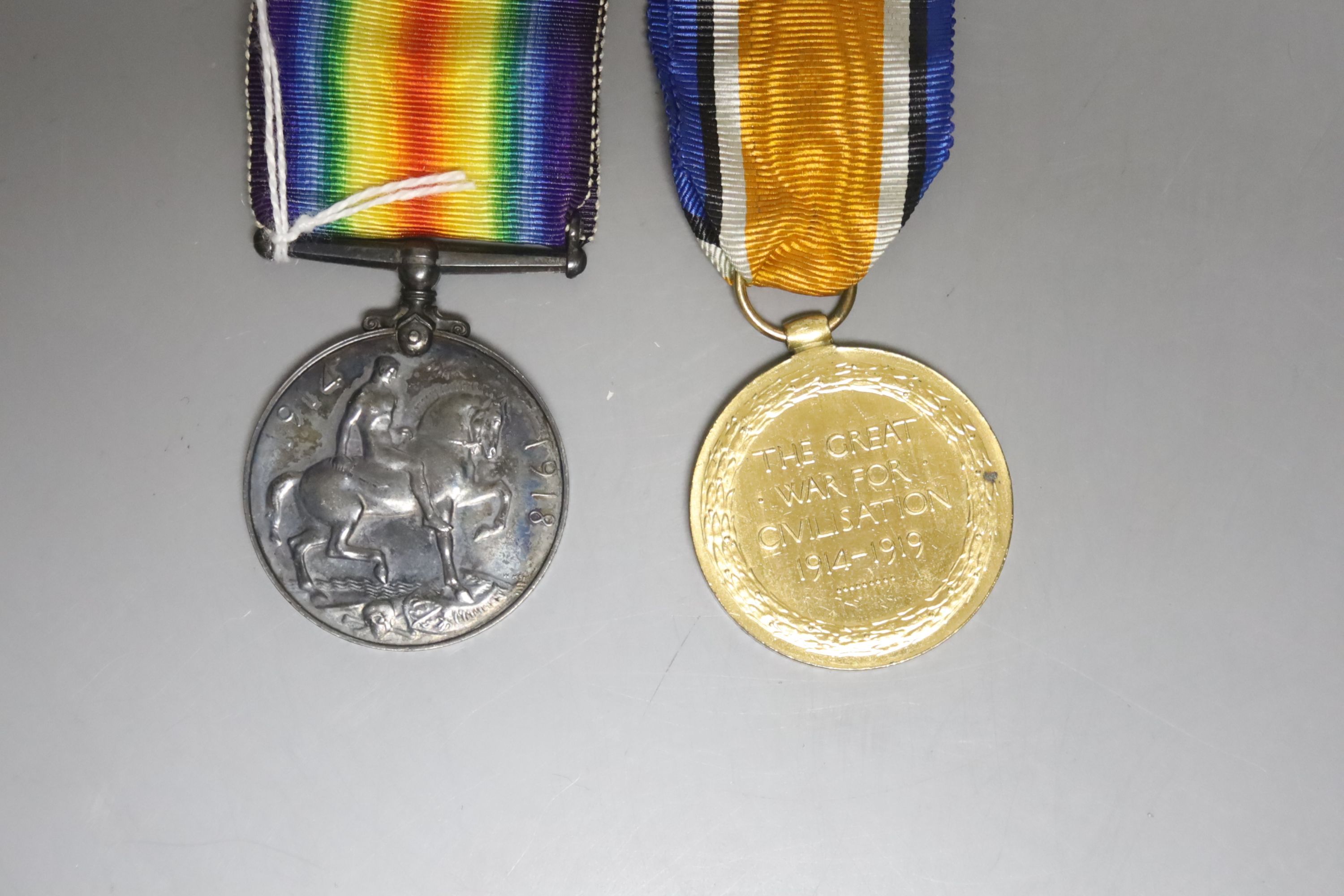 A WWI medal duo to P. H. Blackman RMA, comprising War and Victory medals, with ribbons